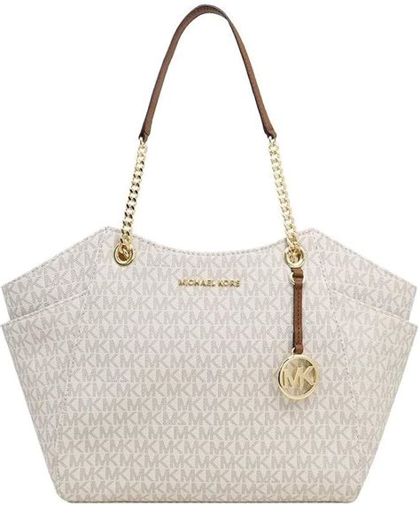 michael kors jet set travel large ivory totes outlet|michael kors bag with airplanes.